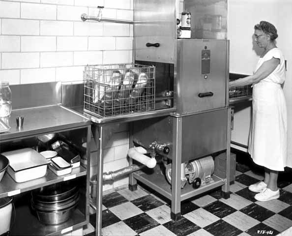 Loading the dish washing machine  11/13/1958